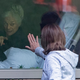 Nursing home visits with loved ones look different with Covid-19.